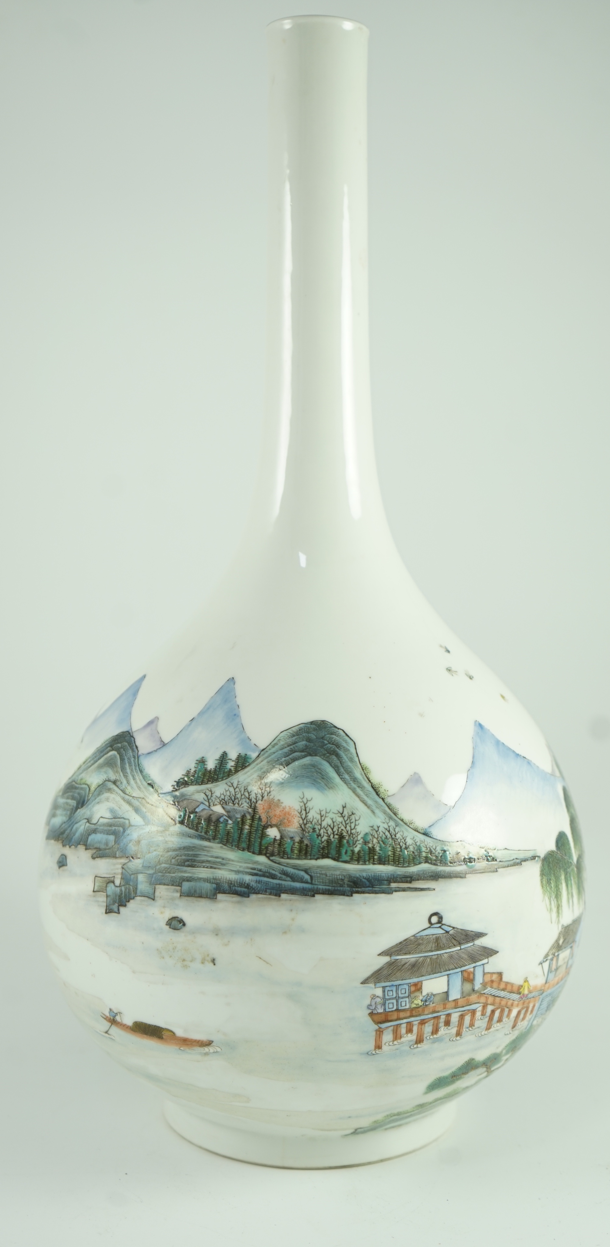 A Chinese enamelled porcelain ‘landscape’ bottle vase, Republic period, 44cm high, hairline crack to neck